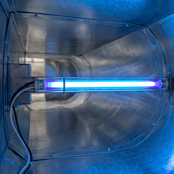 Technician providing complete UV light installation services in Conroe Texas